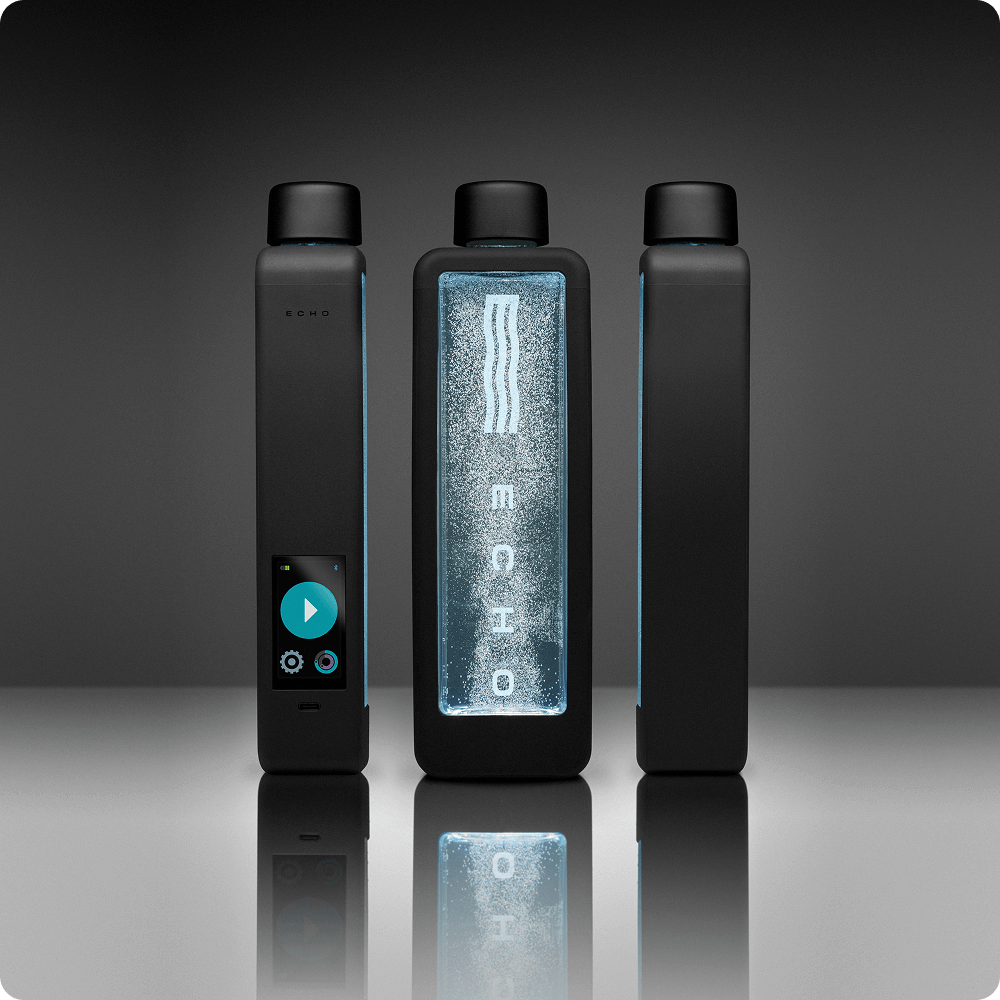 Three black electronic devices with a central one displaying 'ECHO' on a dark background