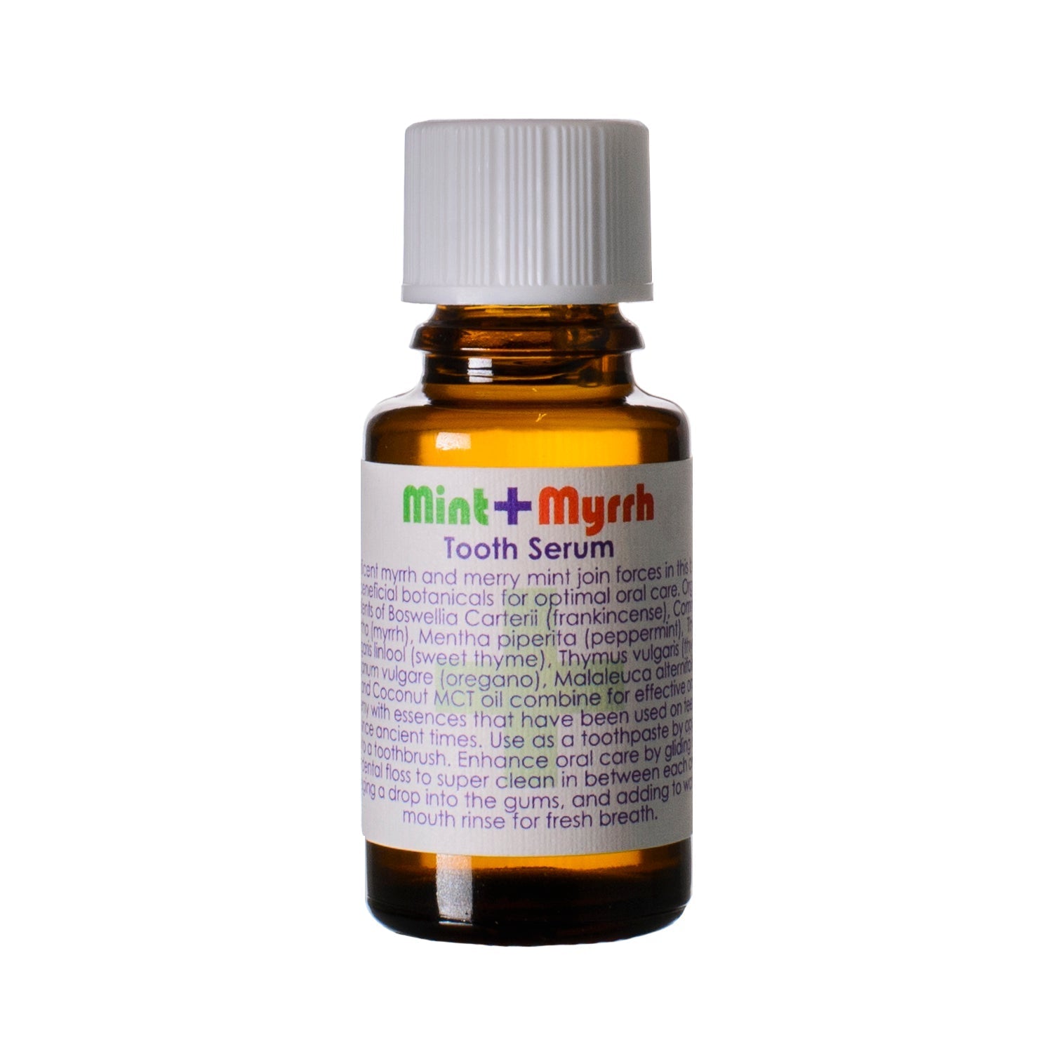 A bottle of Mint + Myrrh Tooth Serum by Living Libations with product information and branding on the label.