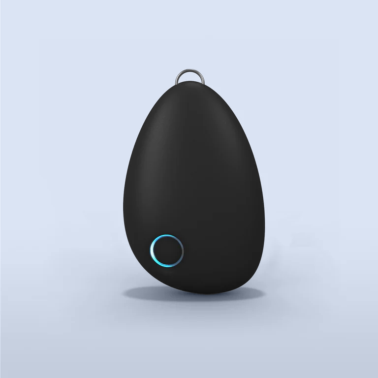 Black teardrop-shaped device with a blue light on a light gray background