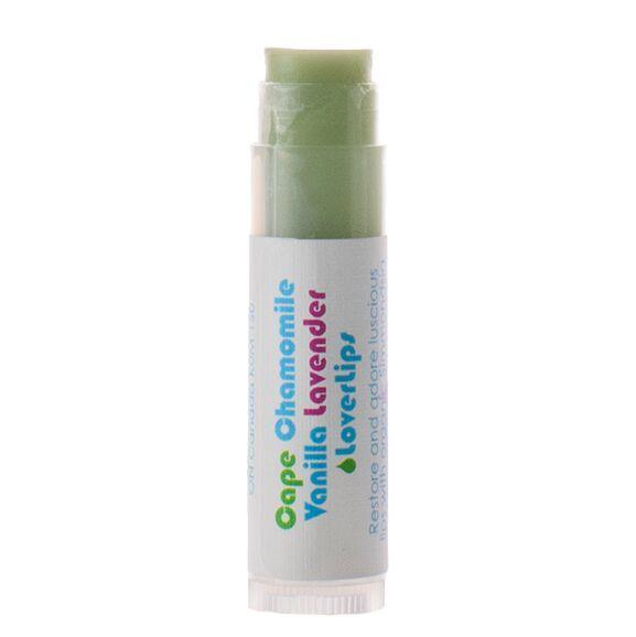 A tube of Chamomile Vanilla Lover Lips by Living Libations with a green label and white text.